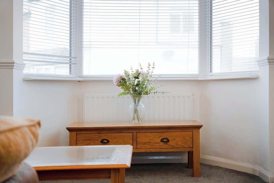 Unwind in our open-plan living and dining area, complete with a Smart TV and a plush sofa for ultimate comfort.