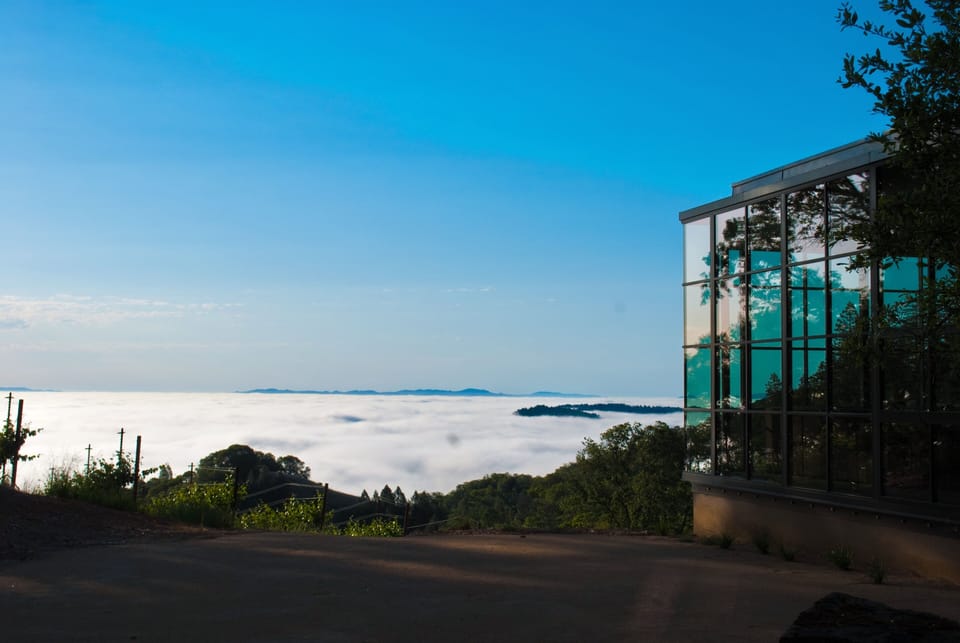 Morning fog at sunrise. Living room at the right
