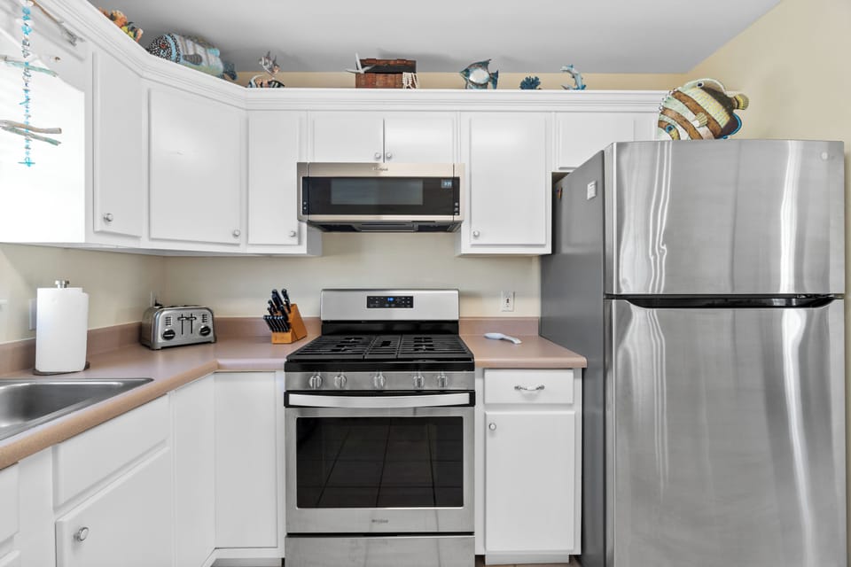 Your fully equipped kitchen features stainless steel appliances and everything you need to prepare delicious meals during your stay.