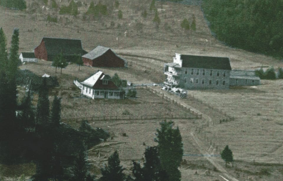 Historic photo of ranch before the hotel was torn down & road was moved.