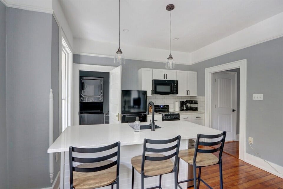Whip up your favorite dishes in this well-equipped kitchen, designed for cooking and gathering with ease.