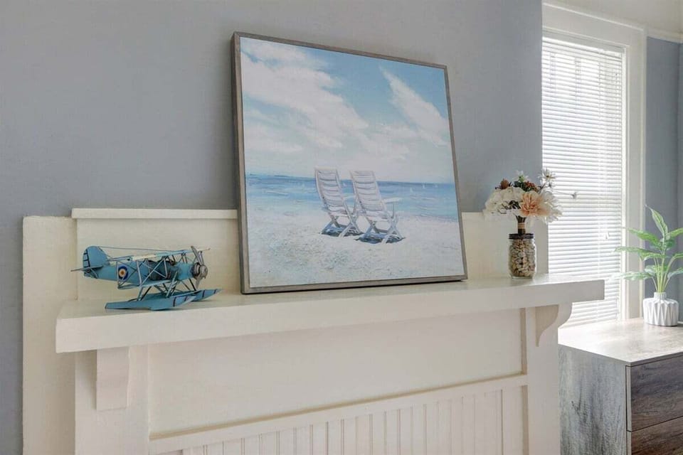 Rest easy in a bedroom adorned with stylish decor, blending comfort and charm for the perfect retreat.