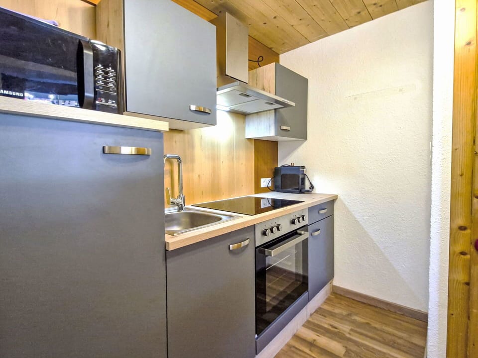 Countertop, Interior Design, Kitchen, Major Appliance, Flooring, Plumbing Fixture, Kitchen Appliance, Cabinetry, Room, Floor