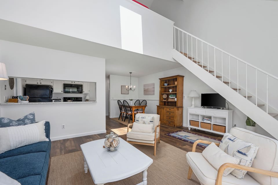 Open Living space with straight stairs to the loft bedroom
