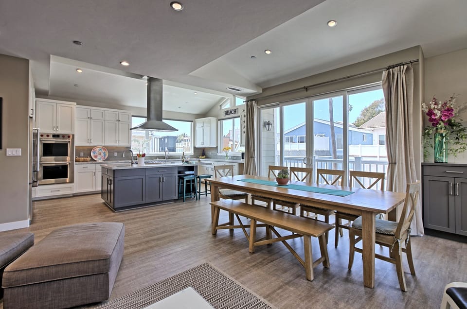 Spacious dining area with seating for 9 10 guests  perfect for family meals and gatherings