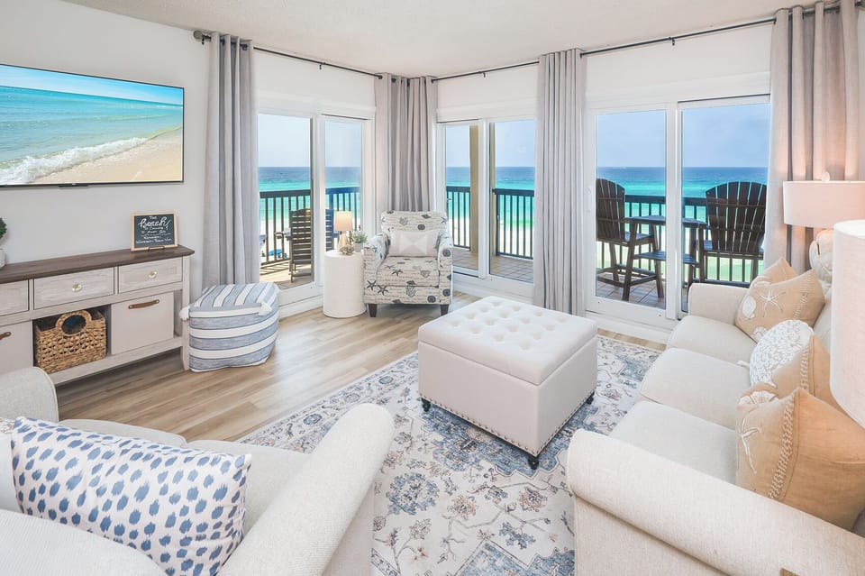 Breathtaking wraparound balcony with stunning views of the Gulf of Mexico visible right from the living room