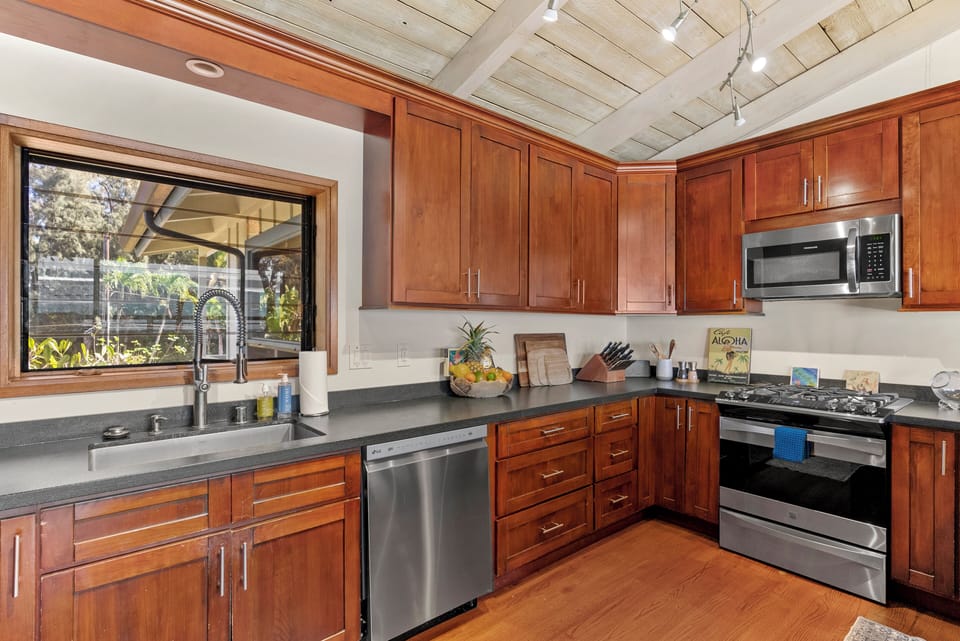 Well-equipped kitchen with ocean views, making cooking a delightful experience.