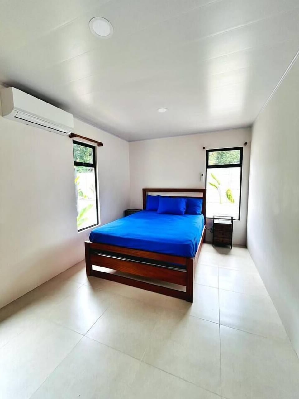 Room 2: queen bed, a/c and closet (1)