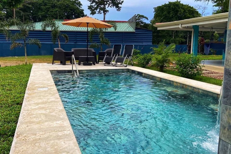 Beautiful pool area with outdoor furniture