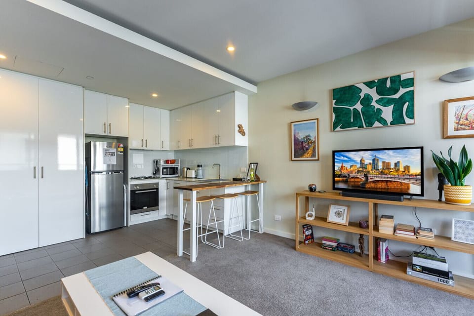 A modern kitchen with cabinets, stainless steel appliances, and plenty of storage.