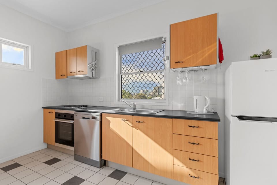 Kitchen with Microwave, Fridge, Stove and Oven for your cooking needs.