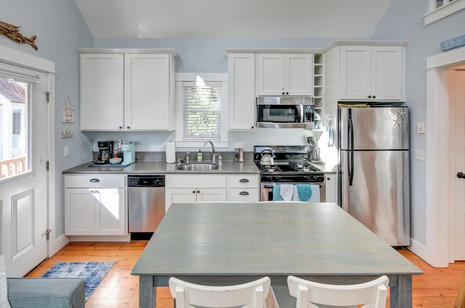 Dining room and a fully stocked kitchen. 