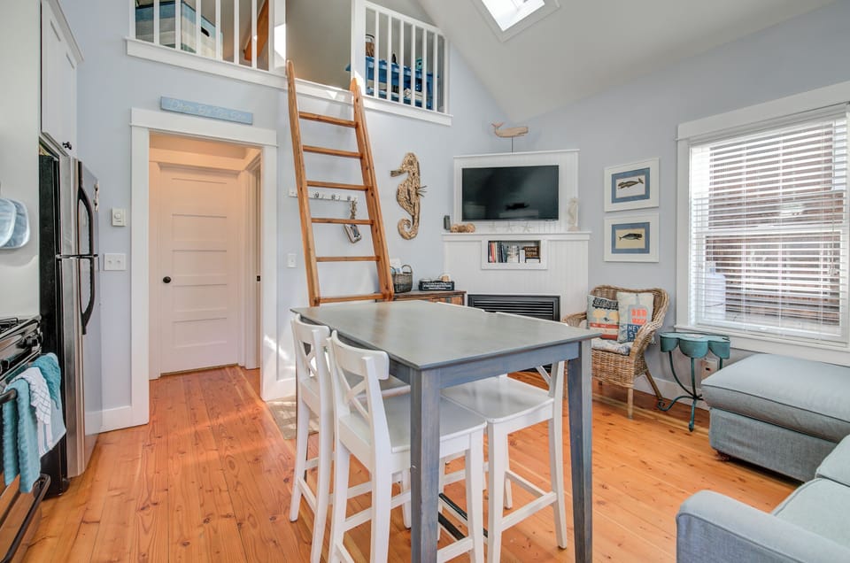 The cabin has an open floor plan with the kitchen, dining room, and living room.