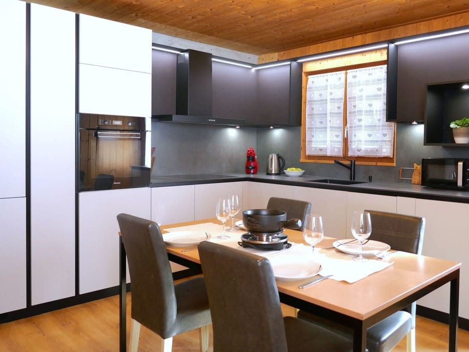 Furniture, Interior Design, Kitchen, Cabinetry, Countertop, Wood, Kitchen Appliance, Flooring, Home, Light Fixture