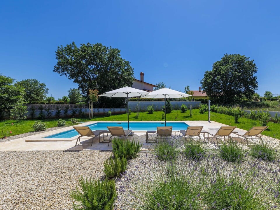 Blue, Swimming Pool, Outdoor Furniture, Resort, Garden, Shade, Chair, Landscaping, Estate, Sunlounger