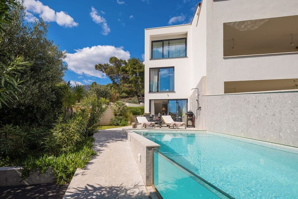Luxury Beachfront Villa Manera Bol for 12 persons with heated pool on promenade Zlatni Rat by the pebble beach