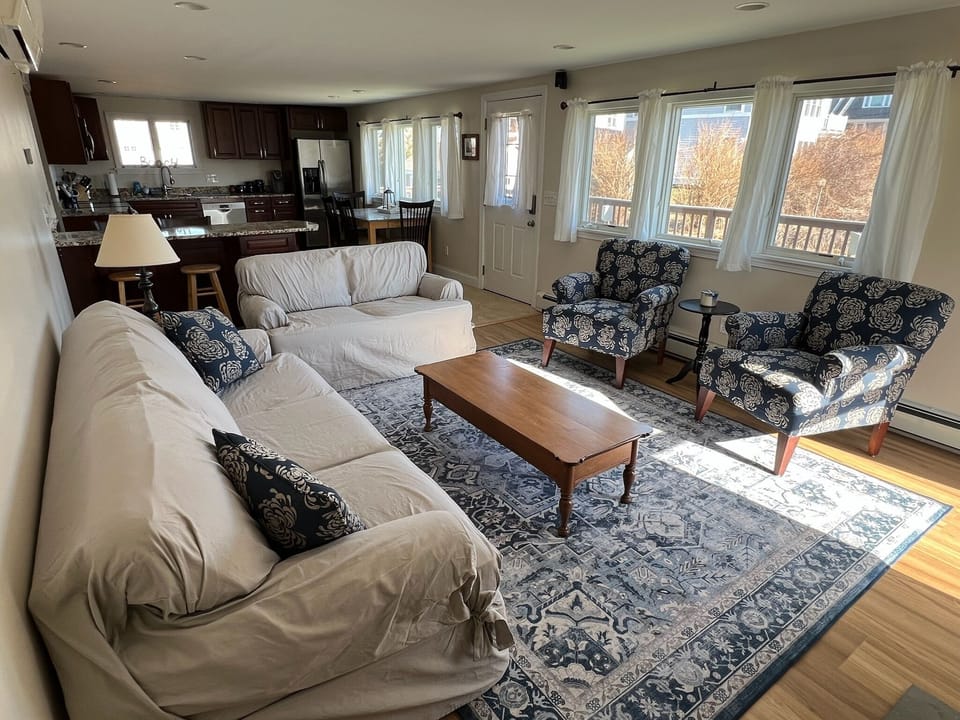 Morning sunlight in an open concept family room and kitchen