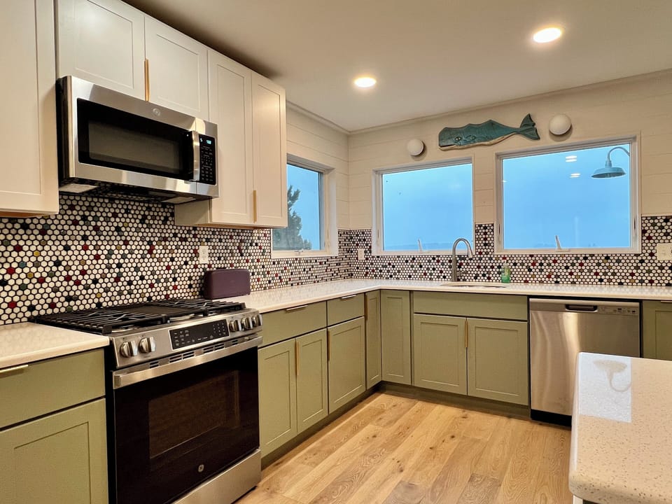Fully stocked kitchen with views of the ocean 