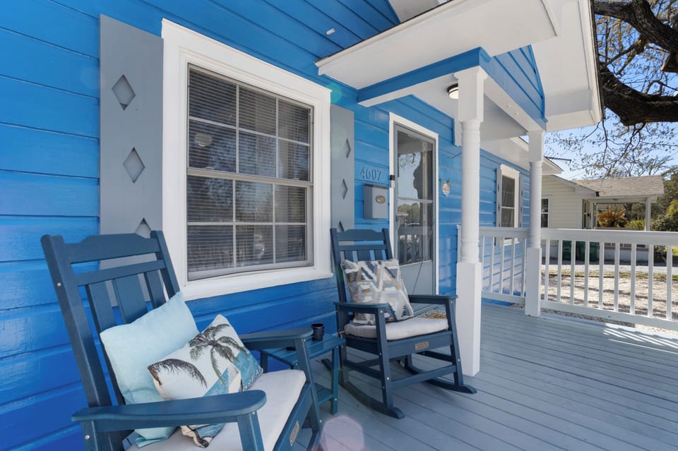 Relax on front porch on the rocking chairs.