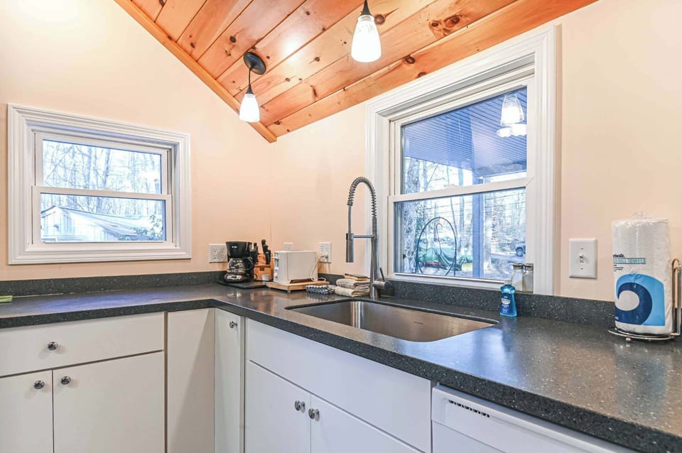 Kitchen and dining space with futon