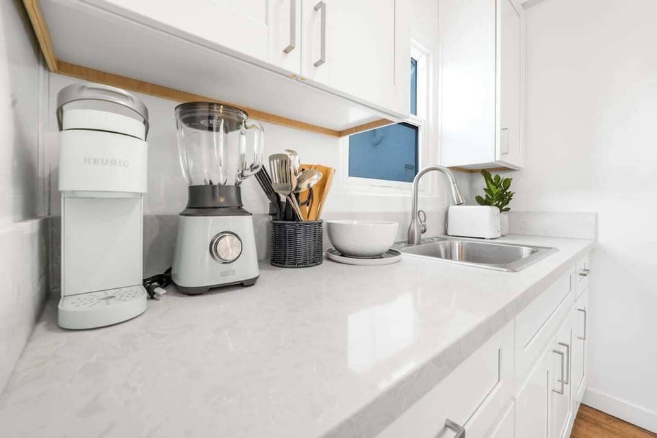 Enjoy the convenience of a fully-stocked kitchen during your stay in our vacation rental. Keurig coffee maker with pods provided!