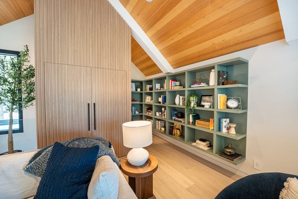 Nestled above the kitchen, this cozy loft is your perfect retreat for curling up with a good book or discovering a hidden board game.