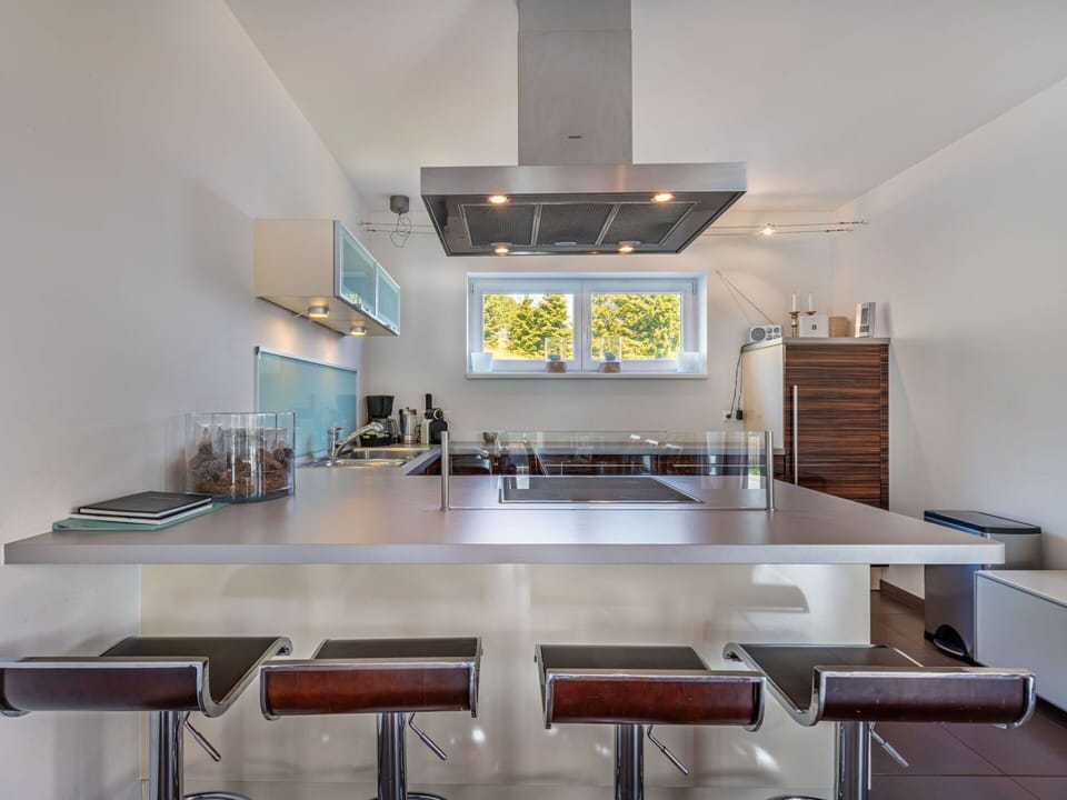Furniture, Kitchen, Interior Design, Countertop, Flooring, Kitchen Appliance, Cabinetry, Wood, Ceiling, Home Appliance