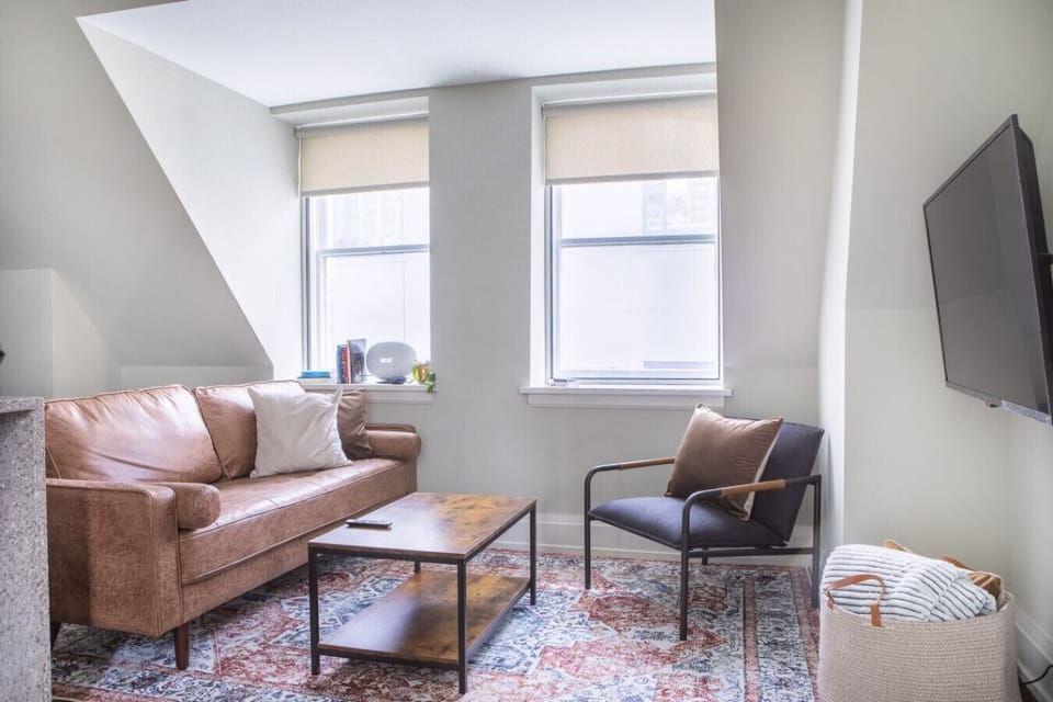 Living room and kitchen with bar stool seating