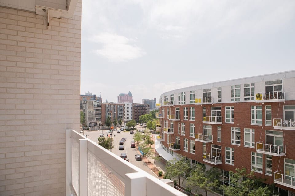 Large private balcony with sweeping city views