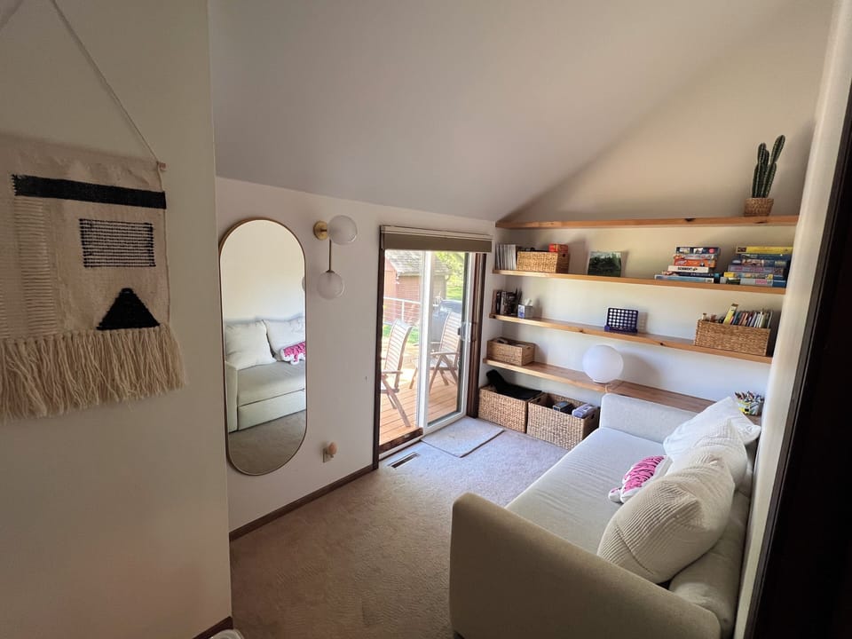 Downstairs bedroom with queen pull-out daybed, with private access to deck.