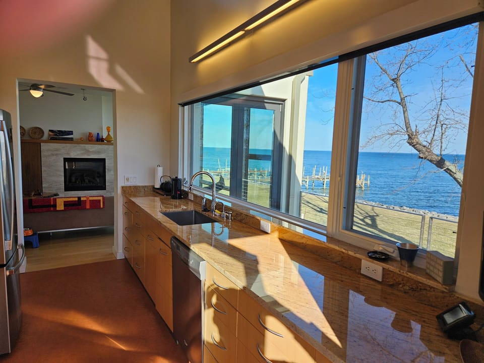 Kitchen with water view and deck.