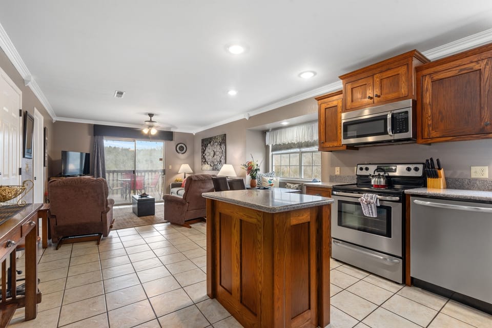 Whip up a delicious meal in the fully equipped kitchen - the heart of your cozy condo that's sure to inspire your inner chef!