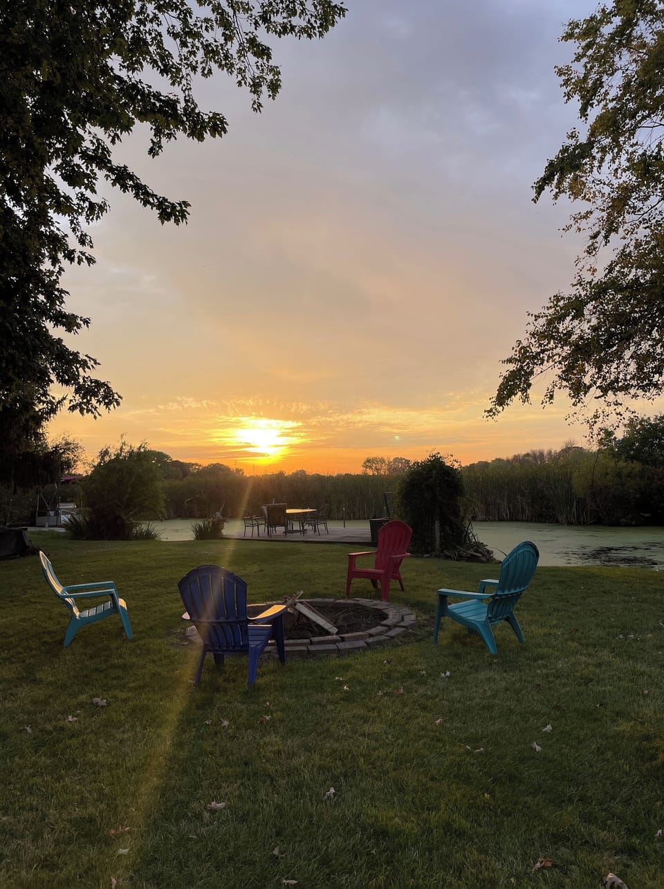 Oshkosh sunsets are amazing! Make a fire and relax!