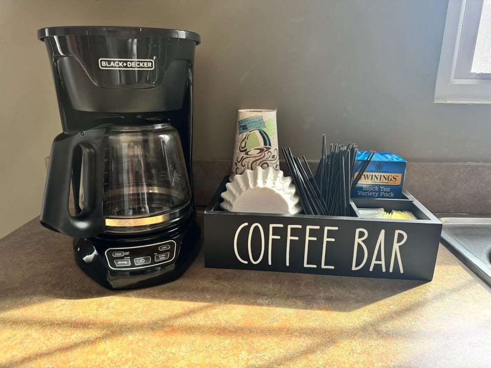 Coffee Bar stocked with local coffee and supplies for your use. 