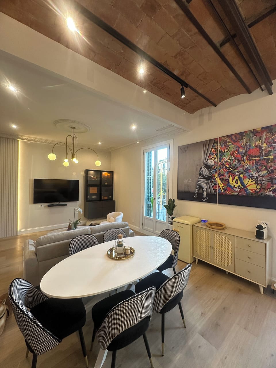 Dining room and beverage area to living room