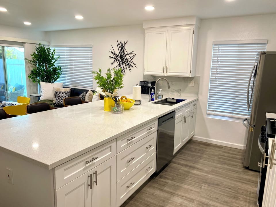 The kitchen island is huge, great for cooking and eating.  