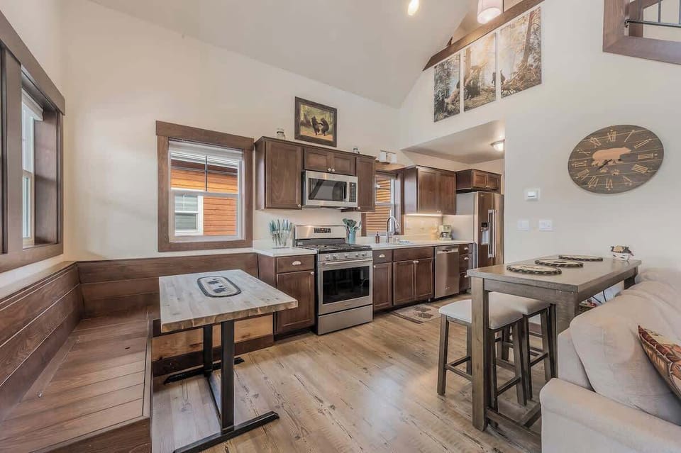 Kitchen dining booth with an additional seating at the island