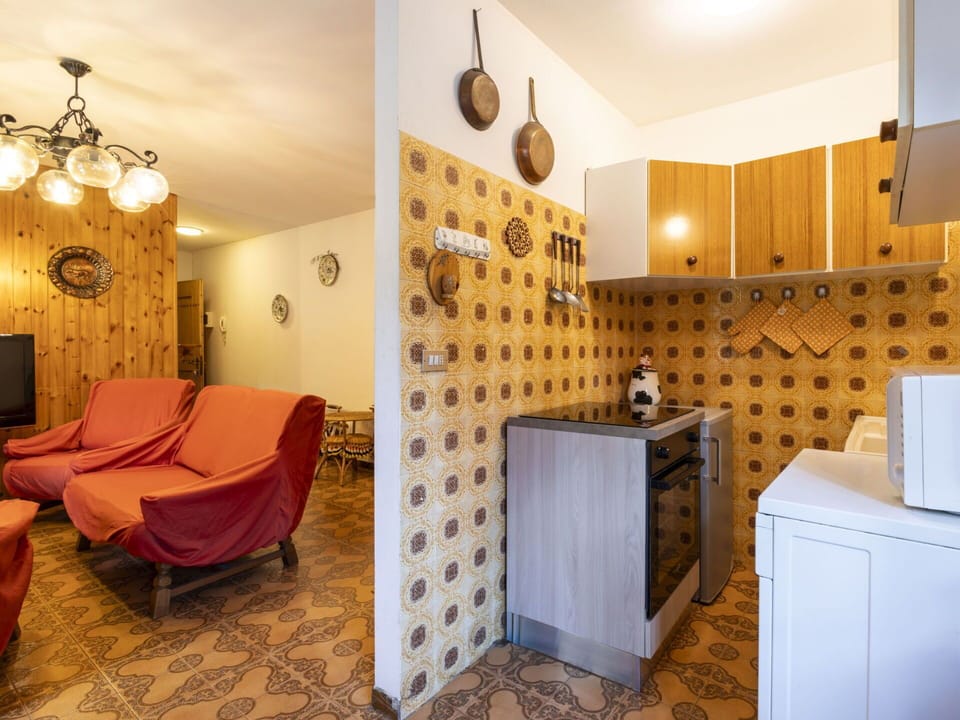 Interior Design, Flooring, Floor, Furniture, Wood, Ceiling, Room, Lighting, Light Fixture, Cabinetry