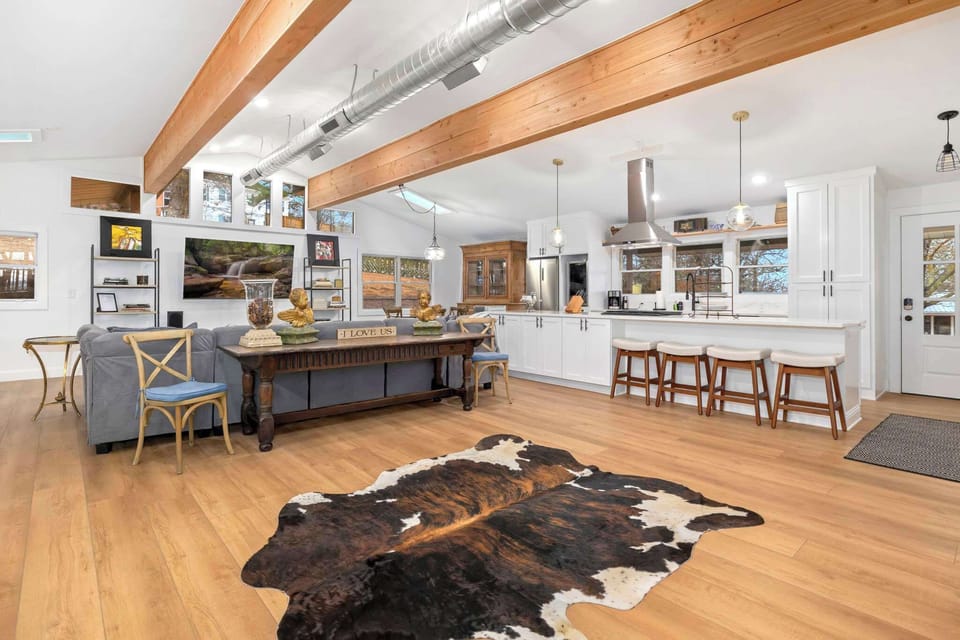 When you walk in our home you will find our open concept living room, kitchen, and dining space that creates the perfect space for memorable gatherings.