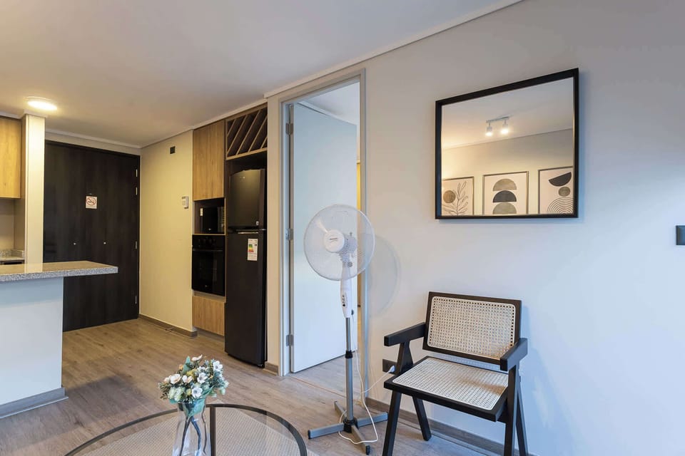 Cozy and modern living area with stylish decor, perfect for relaxing after a day of exploring the city.