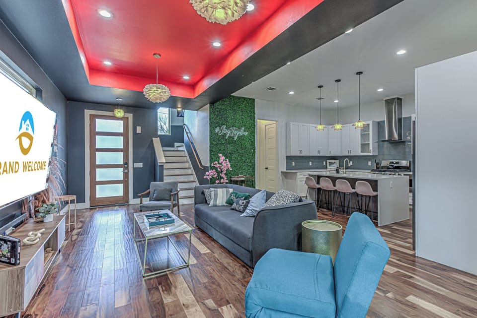 Bright exciting living space with ample seating and Smart TV