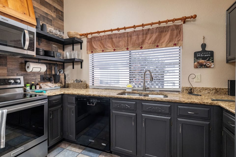 Fully stocked kitchen with coffee bar and cooking essentials