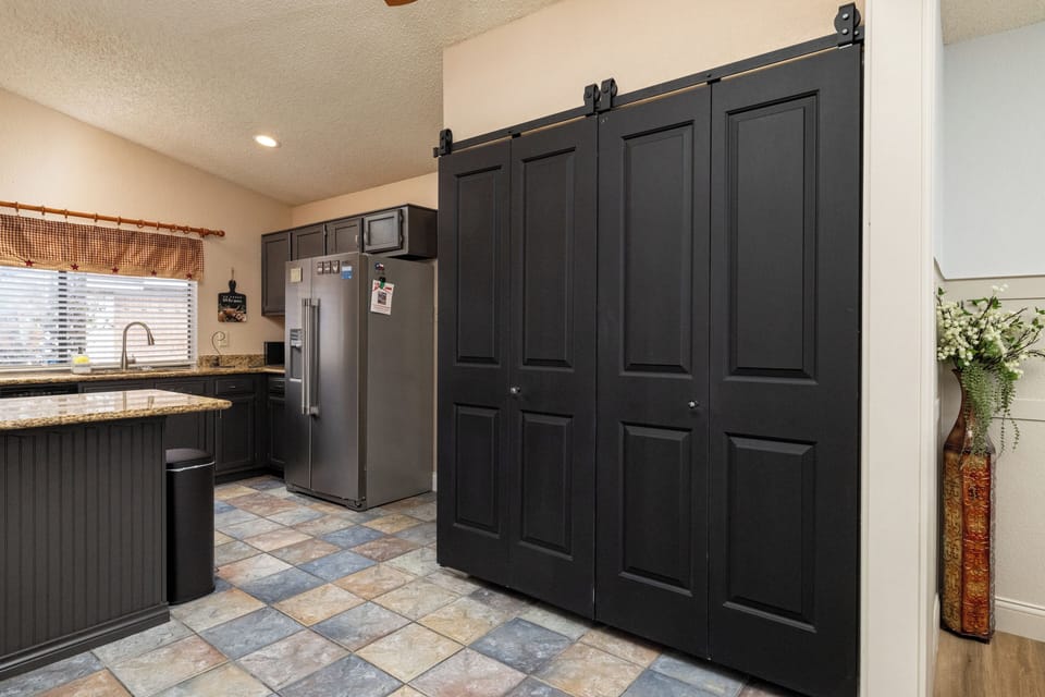 Fully stocked kitchen with coffee bar and cooking essentials