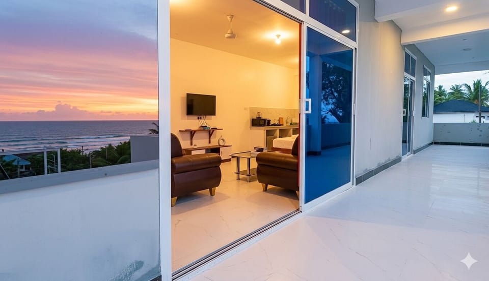 Blacony Facing Sea views And Glass sliding door access to Living Room 