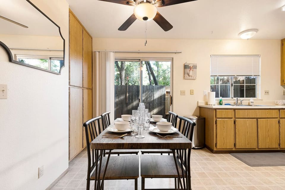 Bright dining area with views of the backyard