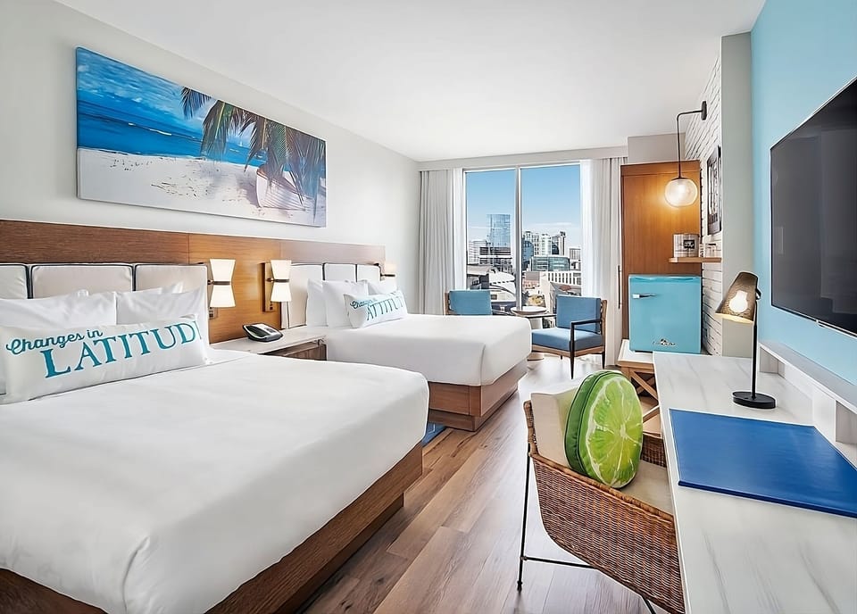 Settle into crisp twin beds and wake to city light.