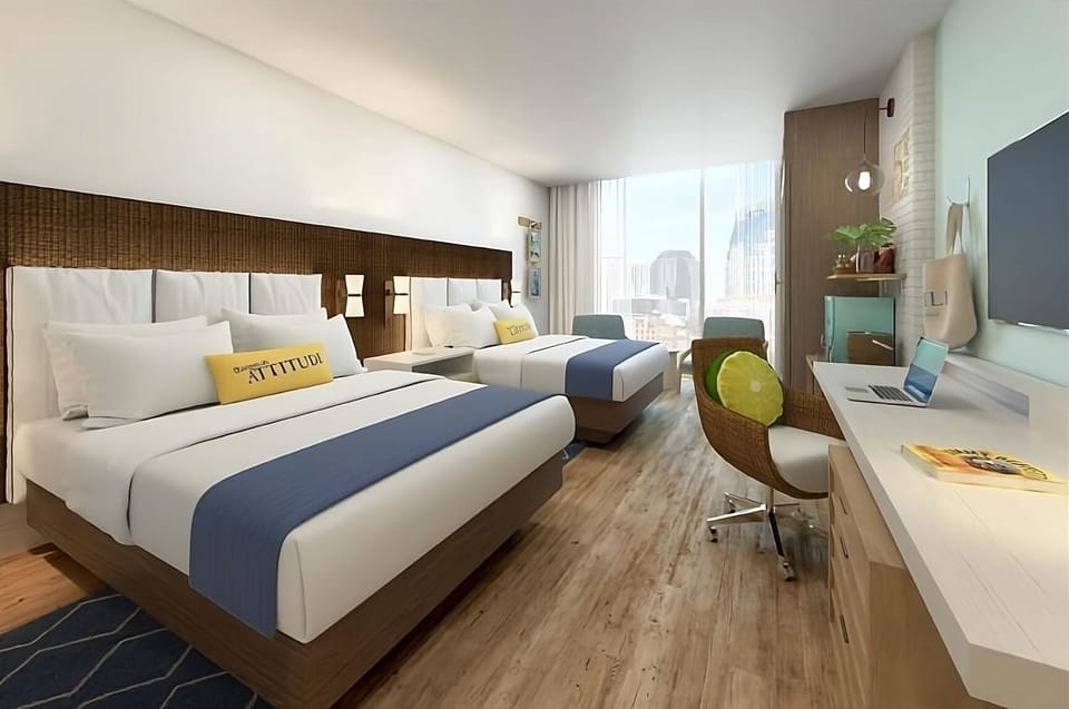 Drift off on premium linens in a calm, modern room.