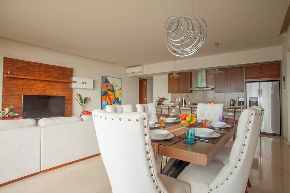 Living, dining, kitchen areas