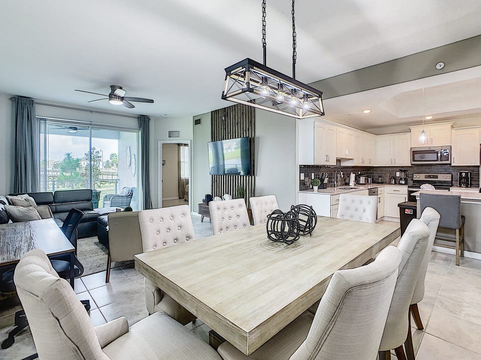 Dining | Features a large table with seating for eight, located off the kitchen.