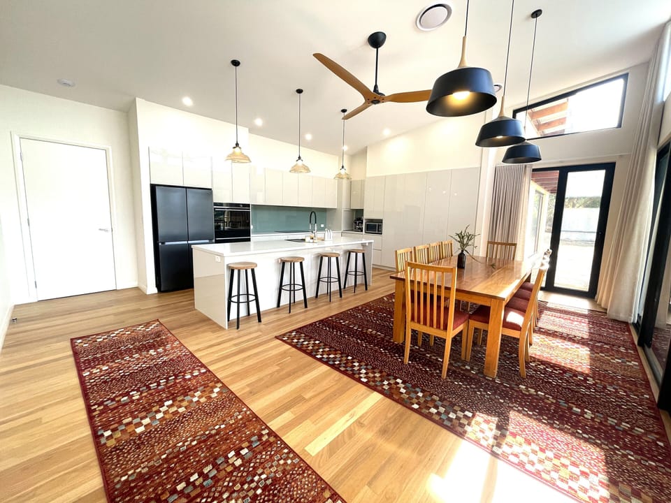 Spacious Kitchen/Dining area with full amenities and views to property.
